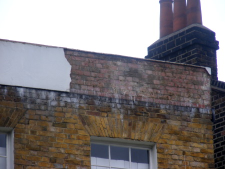 Child taken to hospital after decorative render falls from house