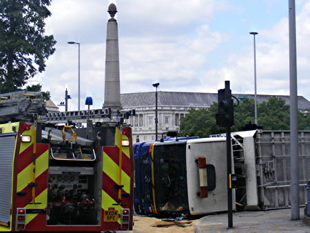 Dust cart overturns at Lambeth Bridge roundabout