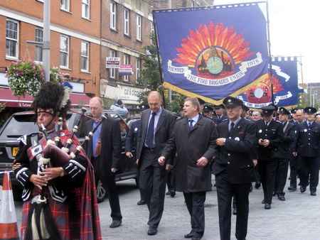 Hundreds of firefighters march through Waterloo streets