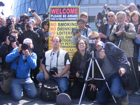 Snappers hold City Hall flashmob in protest at photography restrictions