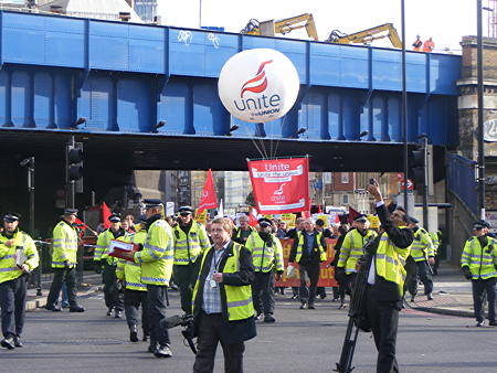 Construction workers march from the Shard to Blackfriars Station