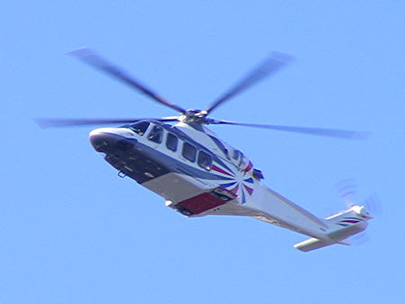 Helicopters fly through middle of Tower Bridge