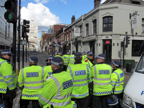 Police in Tower Bridge Road awaiting the return le