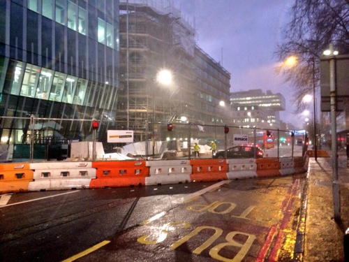 Fence blocks Blackfriars Road as storm scatters building materials