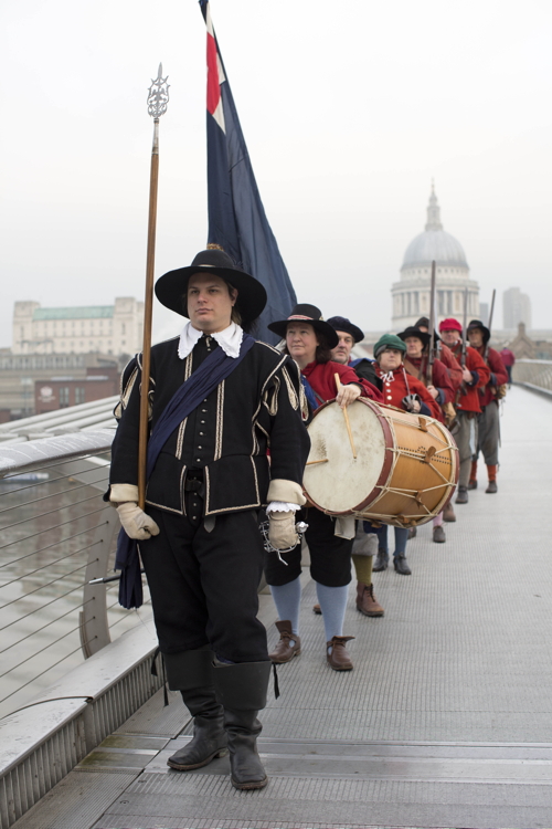 Roundheads march across Millennium Bridge