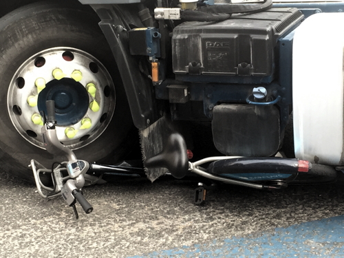 Cyclist escapes with minor injuries as bike is crushed by lorry