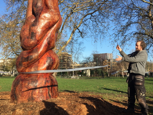 Peace sculpture created from trunk of diseased plane tree