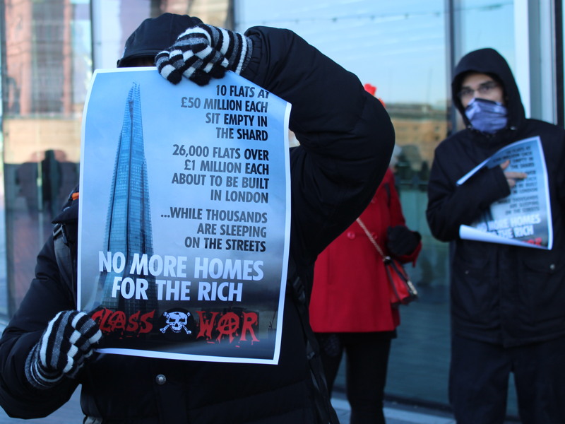 Class War anarchists march on the Shard in protest at empty flats
