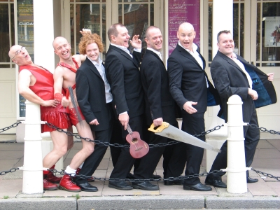 stars of the show outside the Old Vic