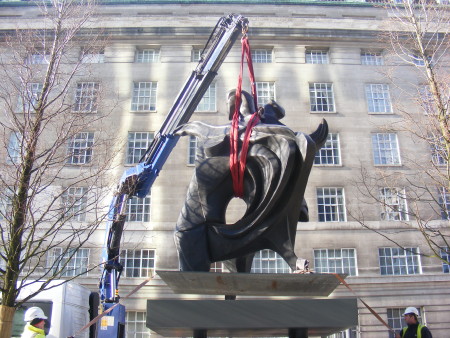 The Dance is lowered onto its plinth outside Park 