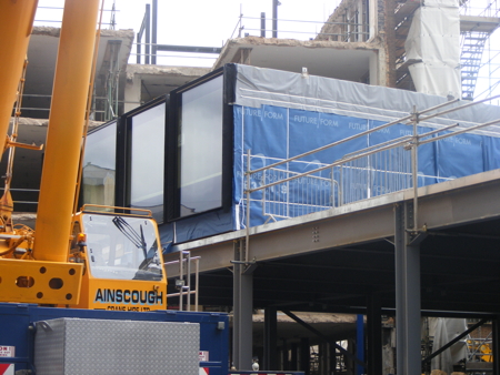 First prefabricated hotel rooms craned into place at citizenM Bankside