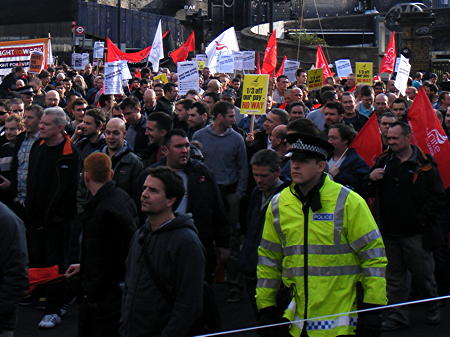 Construction workers march from the Shard to Blackfriars Station