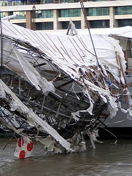 Giant crane lifts HMS Belfast’s collapsed gangway out of the river