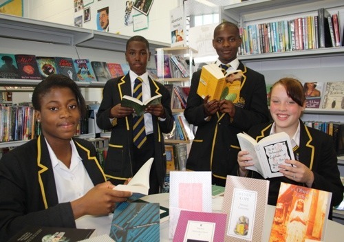 Lord Cholmondeley donates hundreds of books to Globe Academy