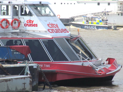 Pleasure boat and container barges in Thames collision