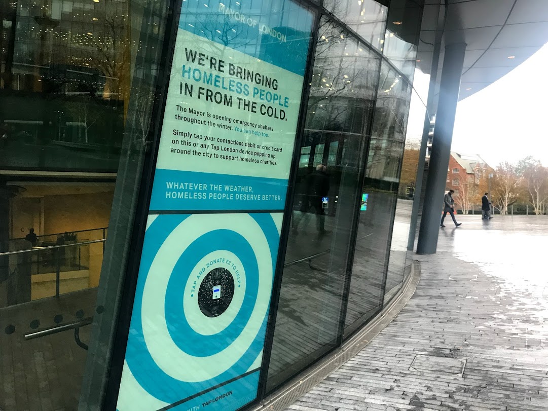 Tap on City Hall window and donate £3 to homelessness charities