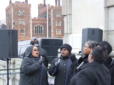 A choir sings 'Amazing Grace' at the southern end 