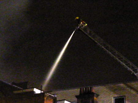 Firefighters tackle the blaze from the New Kent Ro