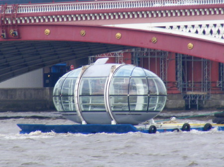 London Eye capsule floats down the Thames