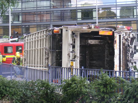 Dust cart overturns at Lambeth Bridge roundabout