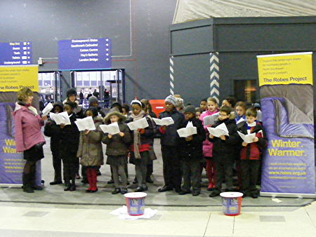 Young carol singers raise money for local winter night shelter