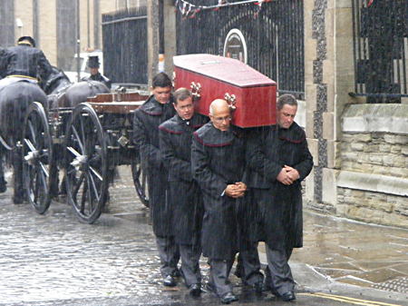 Funeral for unknown man as bodies dug up for rail viaduct are reburied