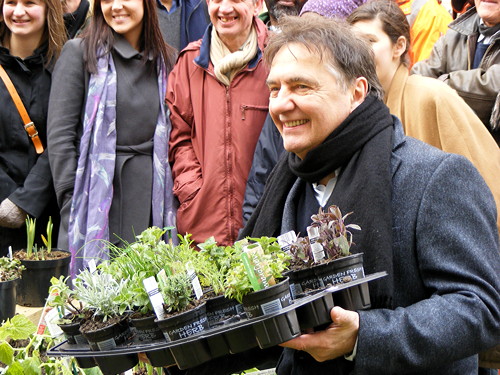 Raymond Blanc poses with a tray of plants at Monda