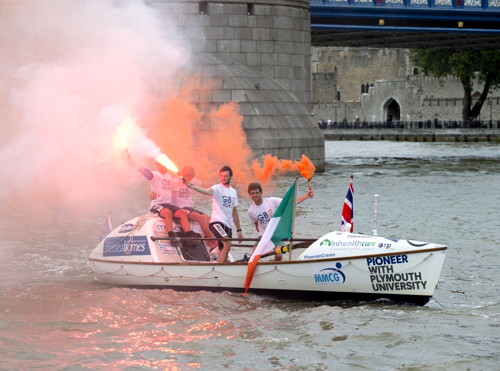 Record-breaking rowers reach Tower Bridge and collect £100,000