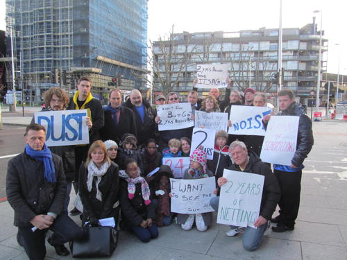 2 years living behind scaffolding: Draper House residents protest