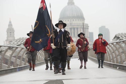 Roundheads march across Millennium Bridge