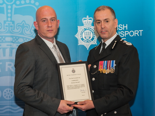 Commendation for ticket inspector who disarmed knife-wielding man